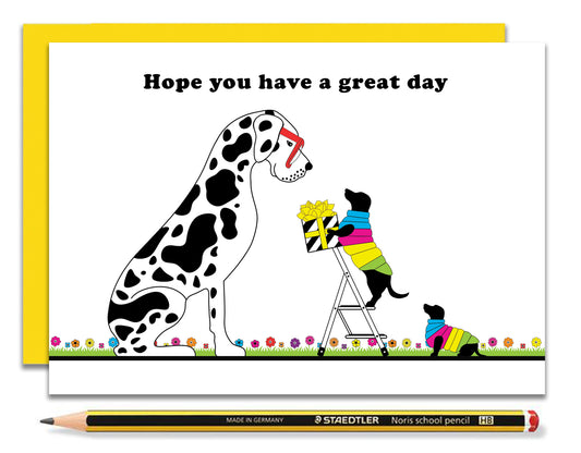 A fun dachshund birthday card featuring dachshunds, Mali & Penny handing their friend Dave, the Great Dane his birthday present. Coupled with a bright, cheerful yellow envelope, with a pencil to show the scale of the card.