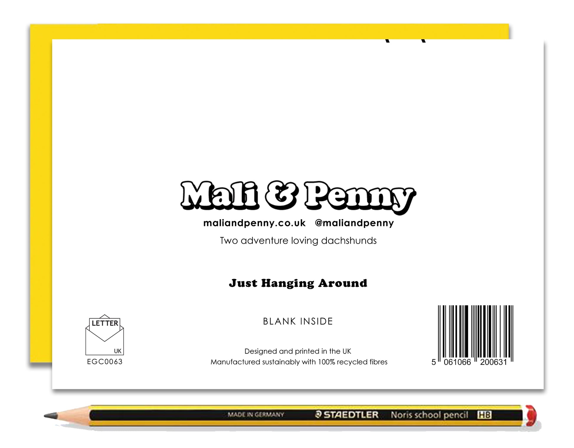 The back of an any occasion card featuring dachshunds, Mali & Penny.  This any occasion card shows them enjoying themselves on a swing together.  Coupled with a bright, cheerful yellow envelope, with a pencil to show the scale of the card.