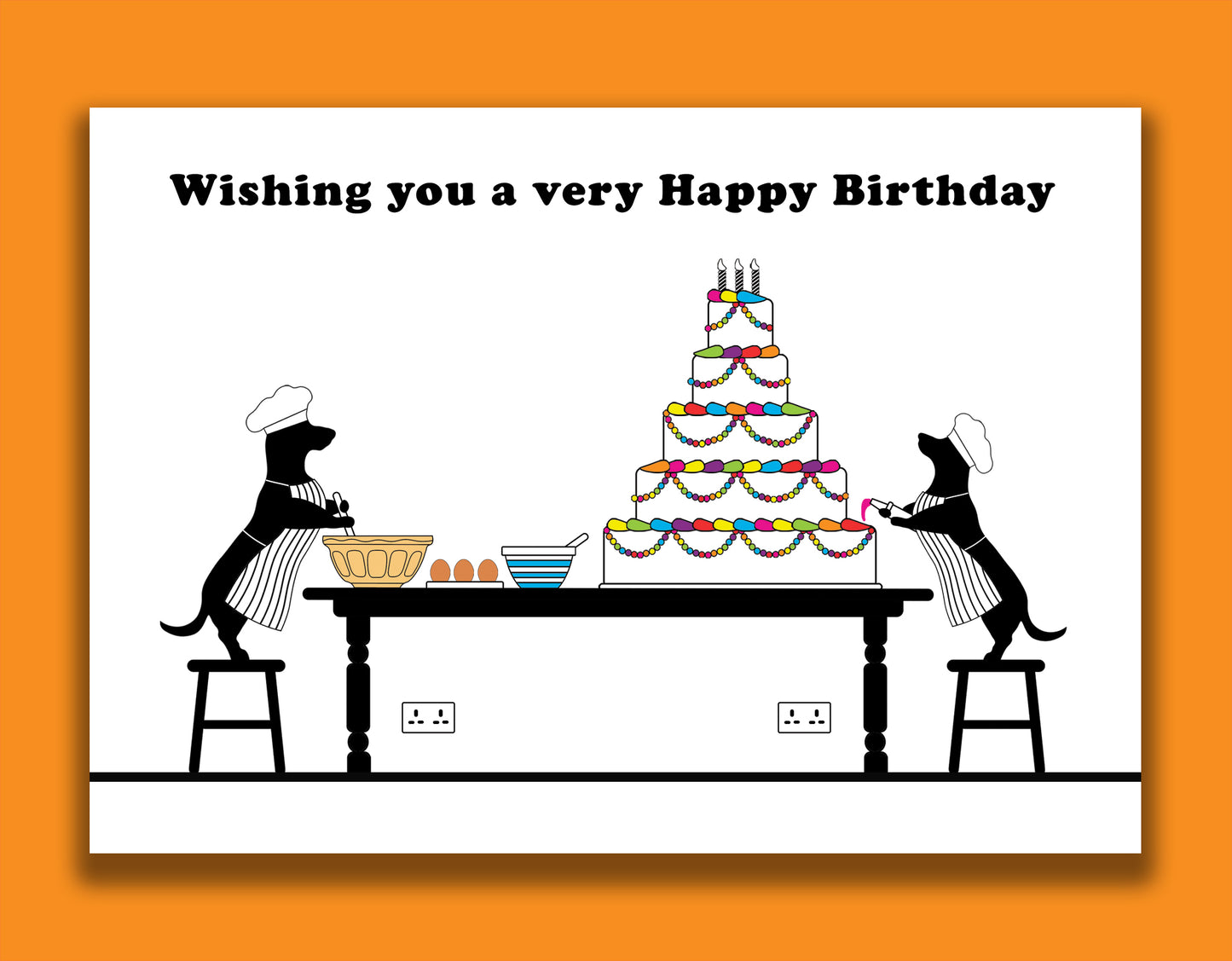 A fun dachshund birthday card featuring dachshunds, Mali & Penny baking and decorating a massive birthday cake. 