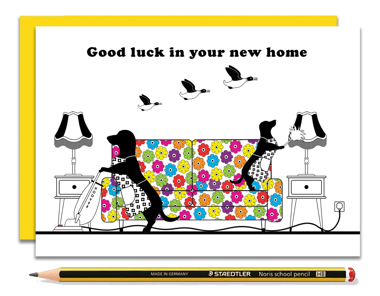 A fun new home card featuring dachshunds, Mali & Penny.  This new home card shows them busy cleaning their new home.  Coupled with a bright, cheerful yellow envelope, with a pencil to show the scale of the card.