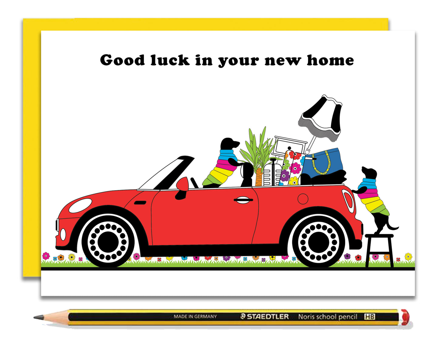 A fun new home card featuring dachshunds, Mali & Penny.  This new home card shows them loading their convertible mini with stuff for their new home.  Coupled with a bright, cheerful yellow envelope, with a pencil to show the scale of the card.